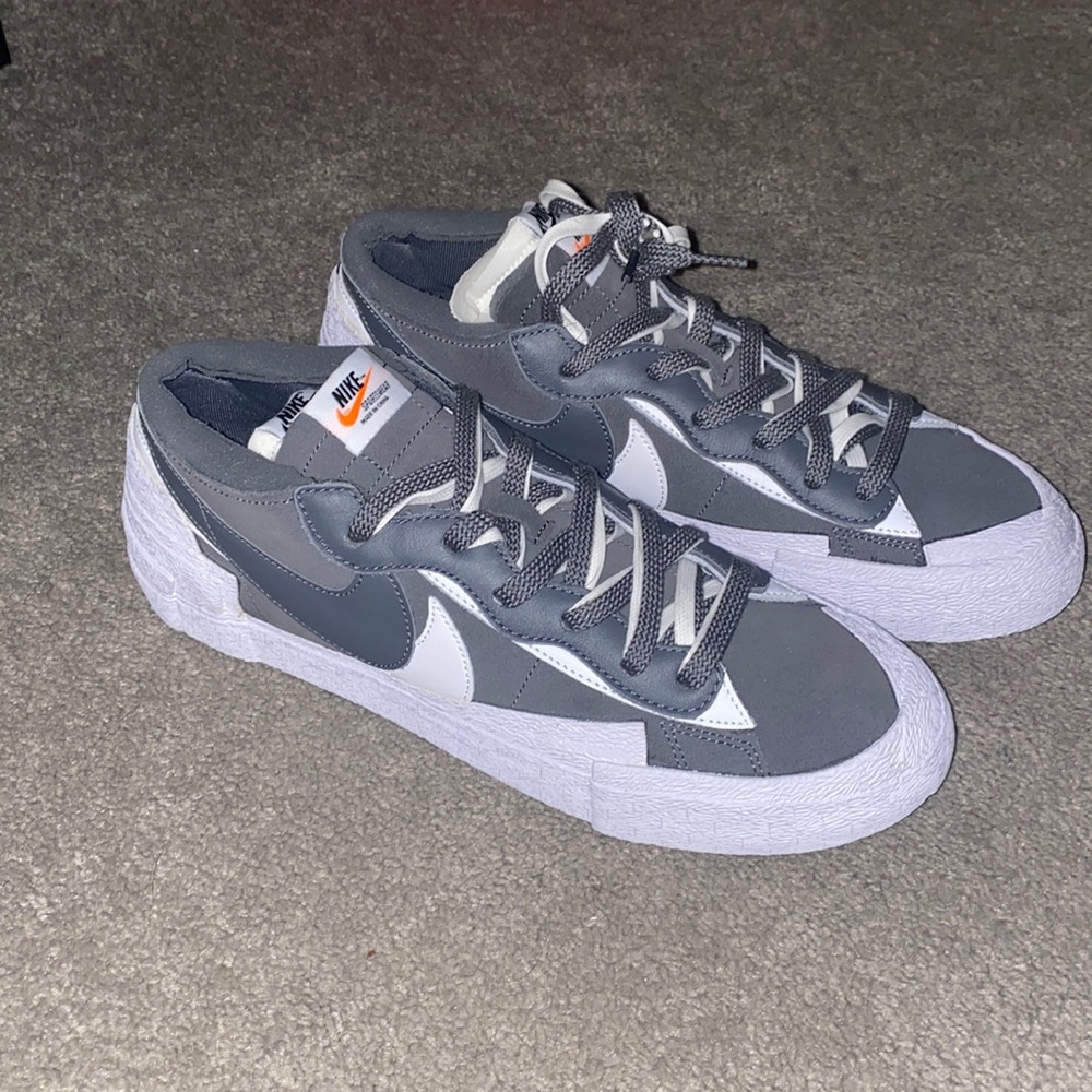 Grey and white casual Nike sneaker. Never worn. In great shape.